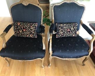 Black upholstered Louis XV-style chairs with accent pillows, 39" tall x 26" wide. Excellent condition. $900 pr.
