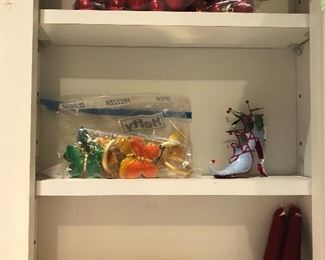 Candle bundles of 4 $5 ea. , bag of small red ball ornaments $1, shoe ornament $1 , set of napkin rings $3