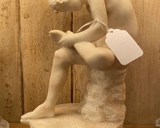 Alabaster carved statue of boy