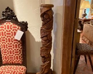 Wood carved pillar with grape and leaves 