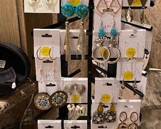 Large collection of designer earrings
