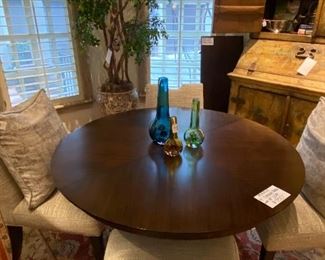 Mirage round dining table with leaf 