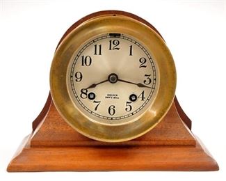 A mid 20th century Chelsea engine room clock made for the "Northwest Instrument Co. Inc. Seattle". 8-day time only movement with seconds bit and a Black dial with luminated hands and Arabic numerals. Black Bakelite case with hinged door.  Minor wear, running when cataloged. 10 1/4" diameter. ESTIMATE $200-400. 