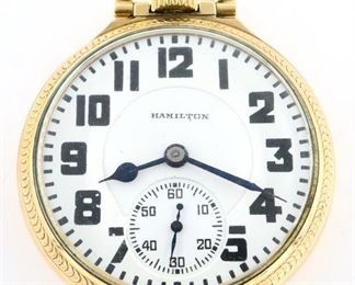 A Hamilton 992E Elinvar Model Railroad watch.  16 size, 21 j, Adj Temp & 5 pos, DR, DMK, GJS, SW, LS, Hamilton Watch Co. GF, OF, Porcelain DSD with bold Arabic numerals marked "Hamilton", serial #2627898.  Minor wear, tiny dial repair at 7:00, winds, sets and running when cataloged.  ESTIMATE $300-400