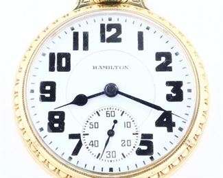 A Hamilton 992E Elinvar Model Railroad watch.  16 size, 21 j, Adj Temp & 5 pos, DR, DMK, GJS, SW, LS, Wadsworth GF, OF, BOC, Porcelain DSD with bold Arabic numerals marked "Hamilton", serial #2647609.  Minor wear, very faint dial hairline, flake at arbor, winds, sets and running when cataloged.  ESTIMATE $300-400