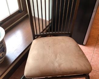 DETAIL OF METAL AND WOOD CHAIR