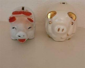 Two Piggy Banks and Lil Piggy