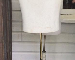 Men’s bust mannequin, we also have mannequins from the 1930s and one from the 60s. The 30s are children, one has a broken neck, and there’s one female from around the 1970s