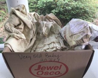 Large boxed lot of antique children’s clothing.