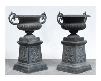 Pair of matching cast iron jardinieres, having floral and scroll motif, supported on pedestals  32"h x 28"w x 19"d