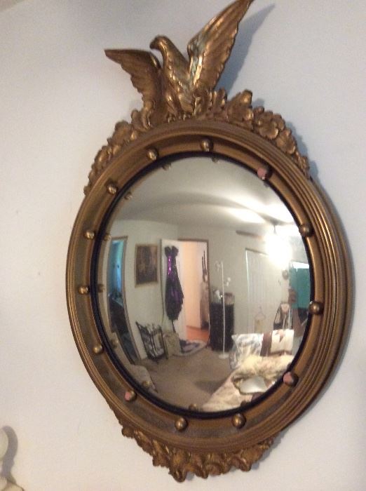 Yes it is real, wood carved antique eagle round convex mirror But it now $ 800.00 