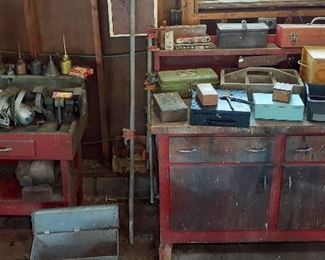 garage cabinets, work bench, boxes, drill press, vise