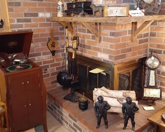 Victrola, clocks, fire place tools, weather station