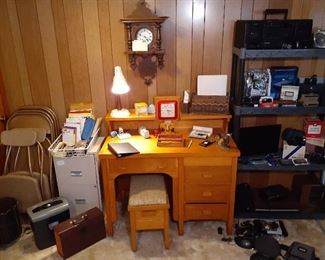 file cabinet, desk, Sony boombox, Polaroid cameras, clocks