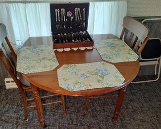 drop leaf table and 4 chairs