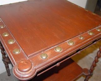 Brass detail on Art Nouveau table. Note also barley twist legs