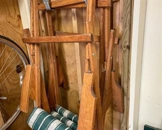 Folding wooden lounge chairs.