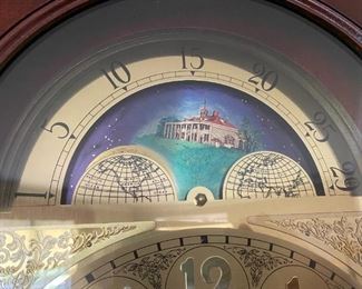Grandfather clock with Mount Vernon logo.