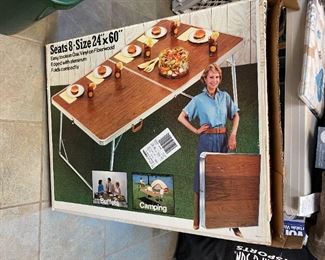 Folding table in box.