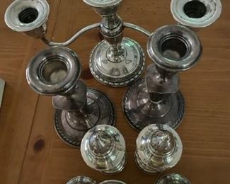 Sterling silver candlestick holders and S/P shakers.
