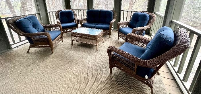 Very Nice Porch or Patio Furniture. Purchased from HOM Furniture and currently used in a three season porch. 

The color of the cushions is noted to be Spectrum Indigo 

Sofa measures 55" x 30" 

Table at 36" x 21" x 19" 

The chairs are 35" arm to arm with an overall height of 38" 