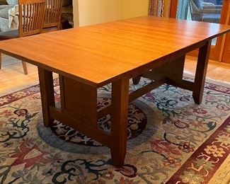 Beautiful Dining Table and Six Chairs in very good condition with light wear. 

As shown; measures 79" x 41.5" with a 15.75" leaf inserted. There is an additional leaf stored under the table. 