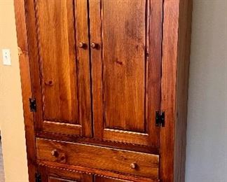 Lovely Armoire Cabinet. A very nice decorative storage piece! Currently used in a dining room. In overall good condition with light wear; please see all photos. 

Measures 33" x 16.5" x 72.5". 