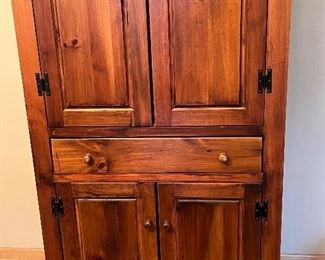 Lovely Armoire Cabinet. A very nice decorative storage piece! Currently used in a dining room. In overall good condition with light wear; please see all photos. 

Measures 33" x 16.5" x 72.5". 
