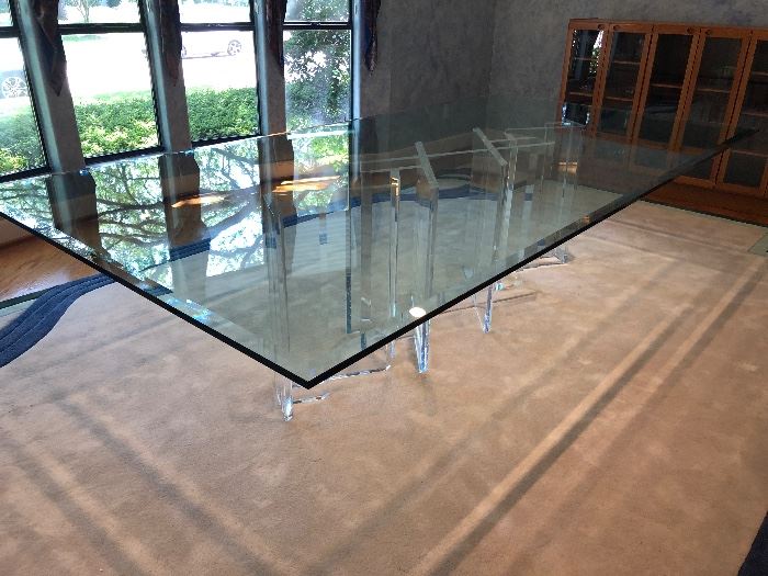 John Mascheroni glass table top with lucite base $8000. 29H x 60W x 120L.  3 pedestals. 
