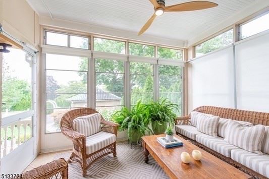 Natural wicker furniture.  3 cushion sofa, 2 chairs + 2 ottmans