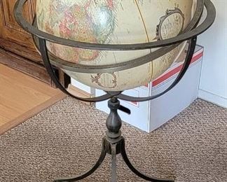 #4.  $60.00. Earth globe on wrought iron stand