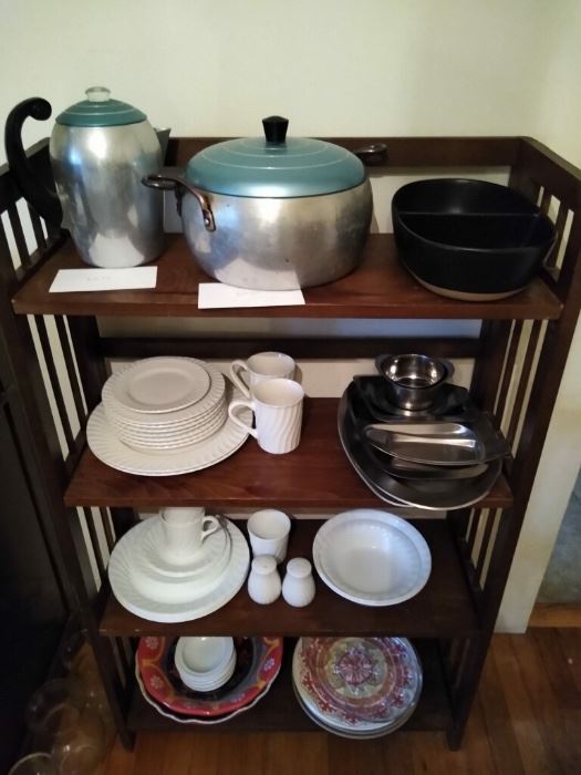 Plates and retro teapot and steamer