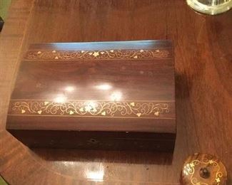 TWO BEAUTIFUL BRASS INLAID BOXES  ALSO SHOWING BANDING ON DINING TABLE