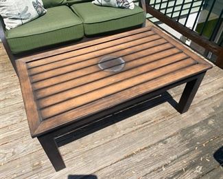 Outdoor Coffee Table 17 3/4"H x 42"L x 24"D              Price  $40.00                                                                                       water stain in center of table 