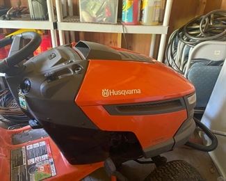 Husqvarna Riding Mower and Gas Cans 