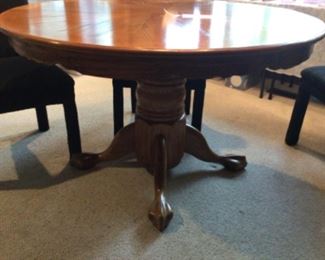 Round Dining Table w/Claw Feet.  It has an 18" leaf