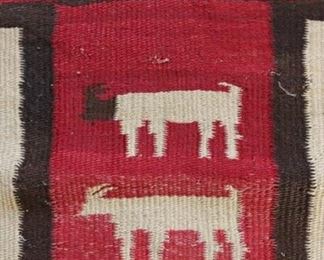 Vintage Navajo rug with sheep