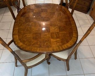 Drexel Heritage dining table without leaves ; 2 each arm and side chairs
