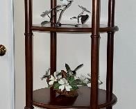 Lineage revolving display cabinet