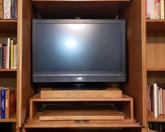 JVC flatscreen tv in entertainment unit