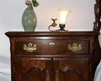 Pennsylvania House night stand; pottery vase; Andrea by Sadek lamp