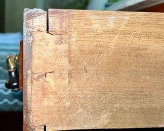 Side view of antique cabinet drawer