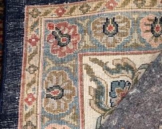 View of reverse of area rug