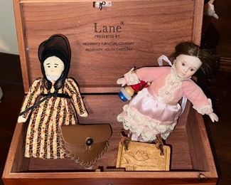 Small Lane cedar box; vintage cloth doll; small handmade change purse; small porcelain doll; wooden box