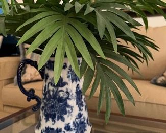 Blue and white pitcher with ferns