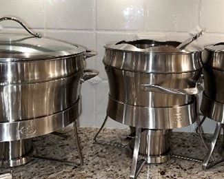 Calphalon chaffing dish; two Calphalon fondue sets