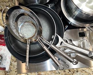 Calphalon non-stick pans; three sizes of sifters