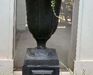 Wrought iron pedestal and planter