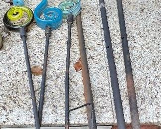 Various hand blown glass yard ornaments; hummingbird feeders