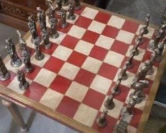 Brass Chess Set on Checker Board Table
